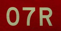 Cartel de la cabecera 07R de la tercera pista